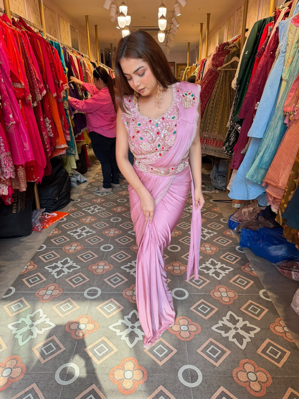 Pastel Pink Pre-Draped Saree with Embellished Sleeveless Blouse