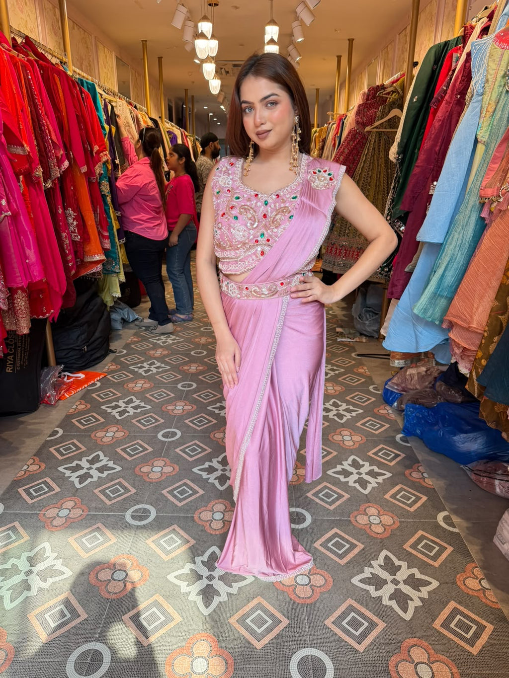 Pastel Pink Pre-Draped Saree with Embellished Sleeveless Blouse