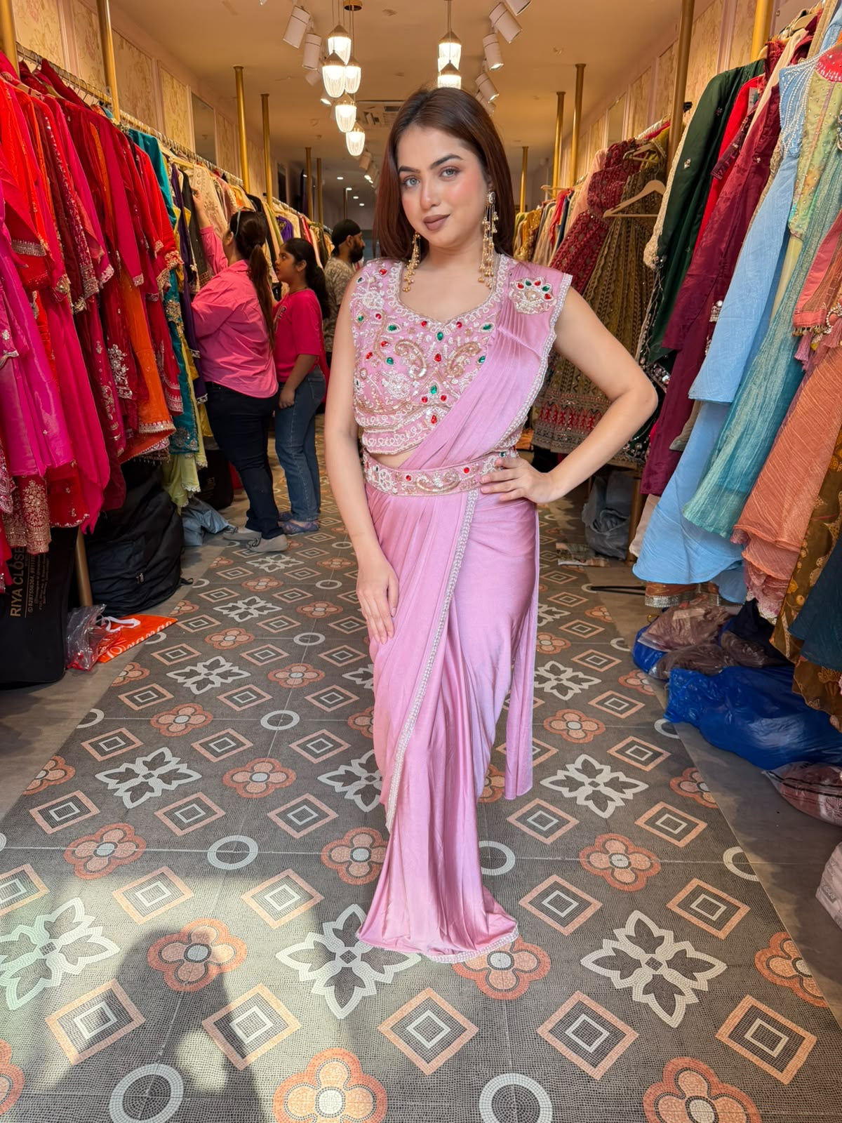 Pastel Pink Pre-Draped Saree with Embellished Sleeveless Blouse