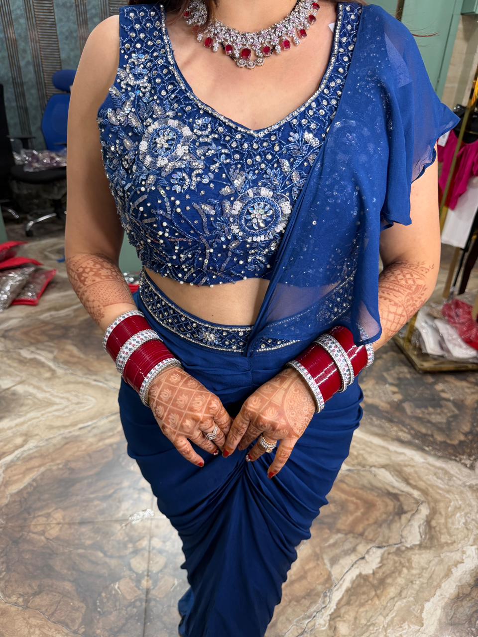 Blue sequins work draped saree
