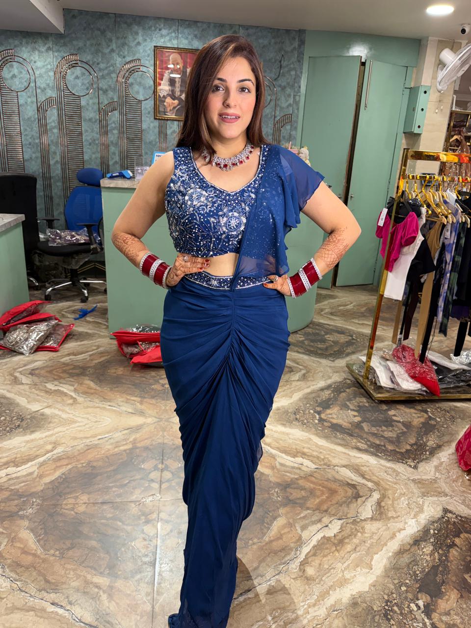 Blue sequins work draped saree