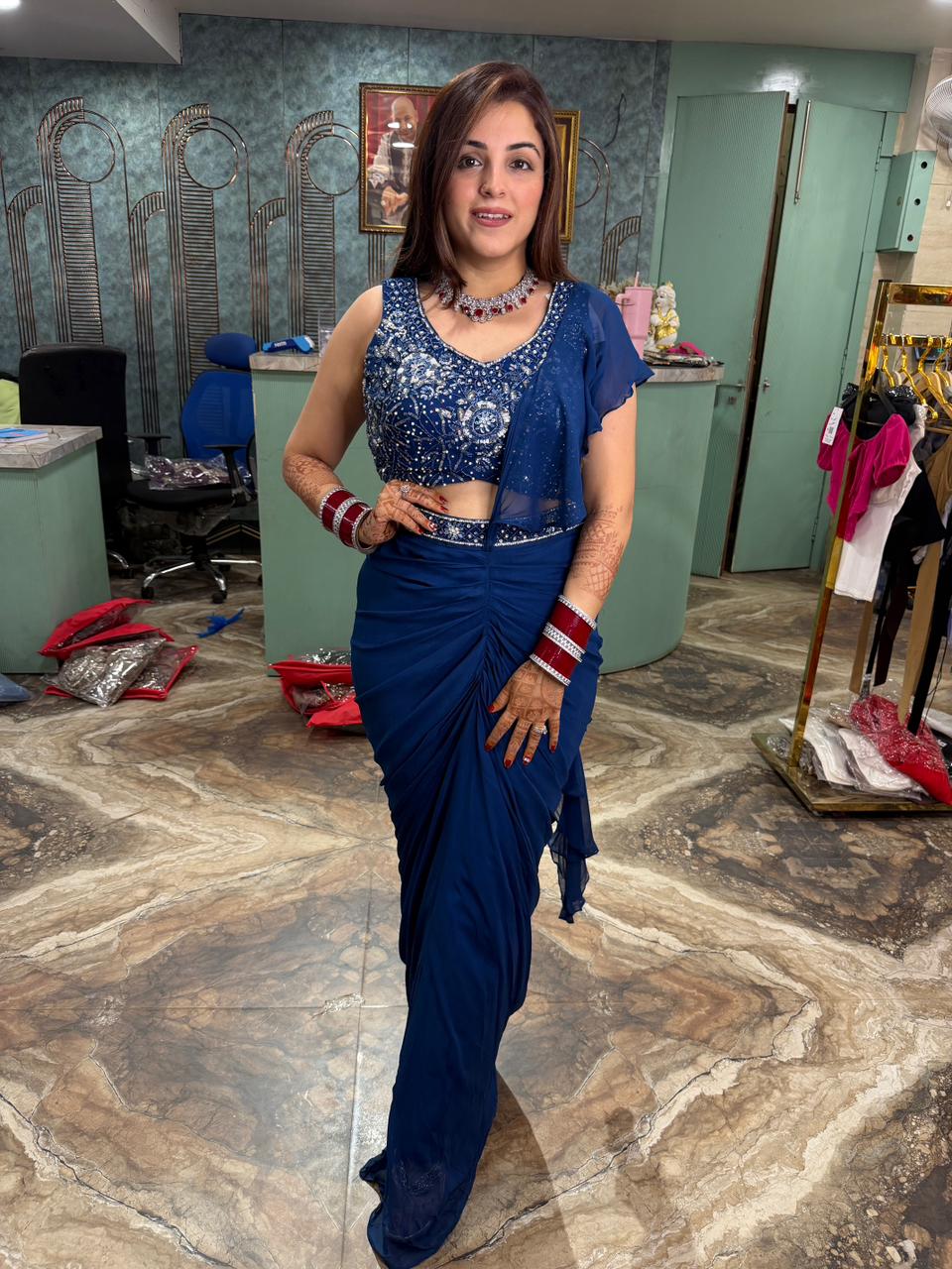 Blue sequins work draped saree