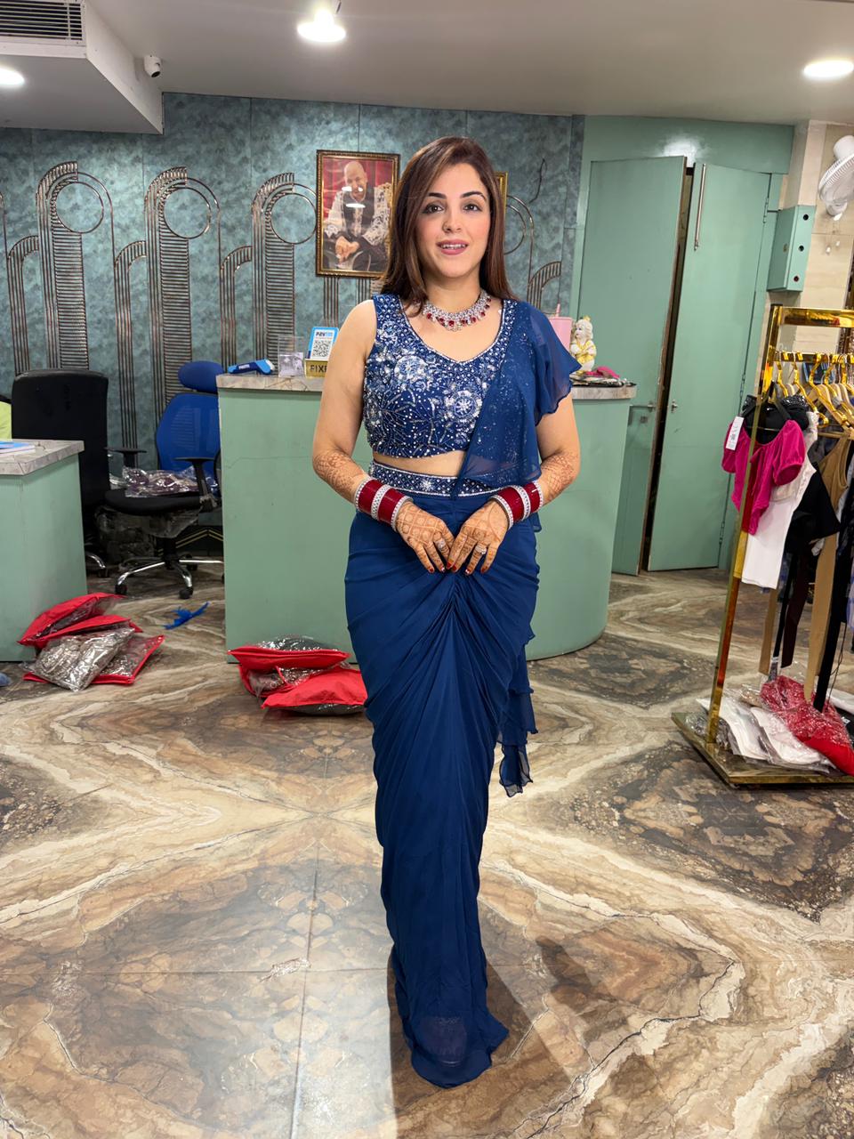 Blue sequins work draped saree