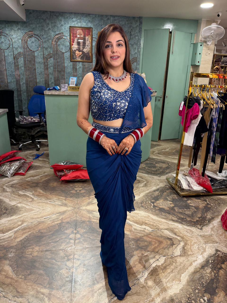 Blue sequins work draped saree