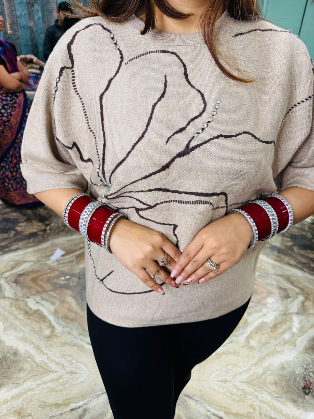 Flora Embroidered knit top