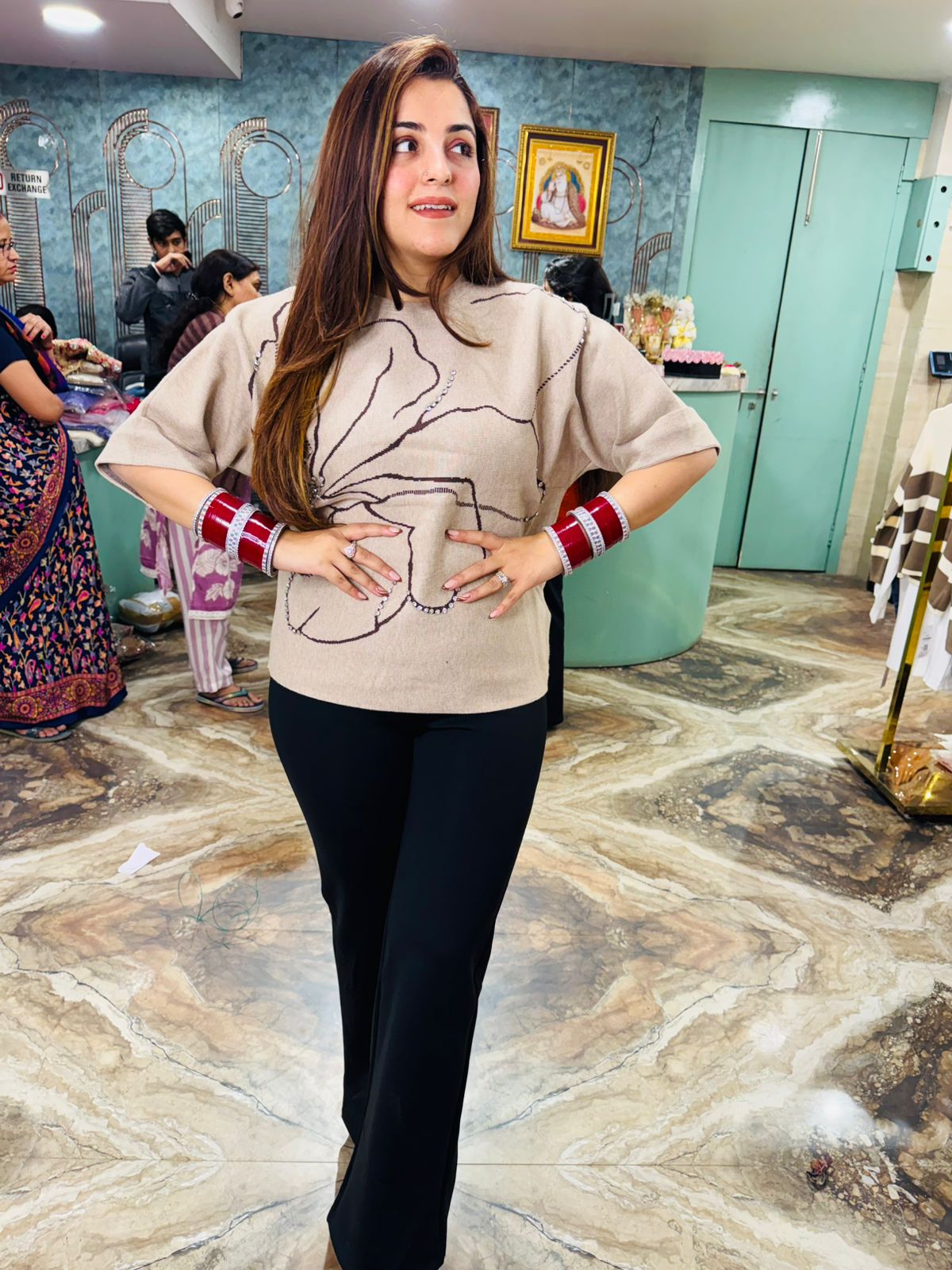 Flora Embroidered knit top