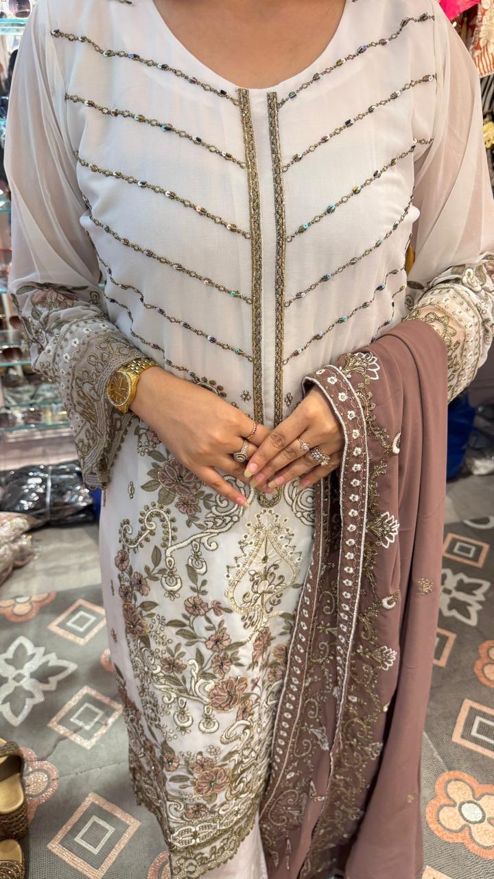 Straight long kurta with matching pants and elegant draped dupatta
