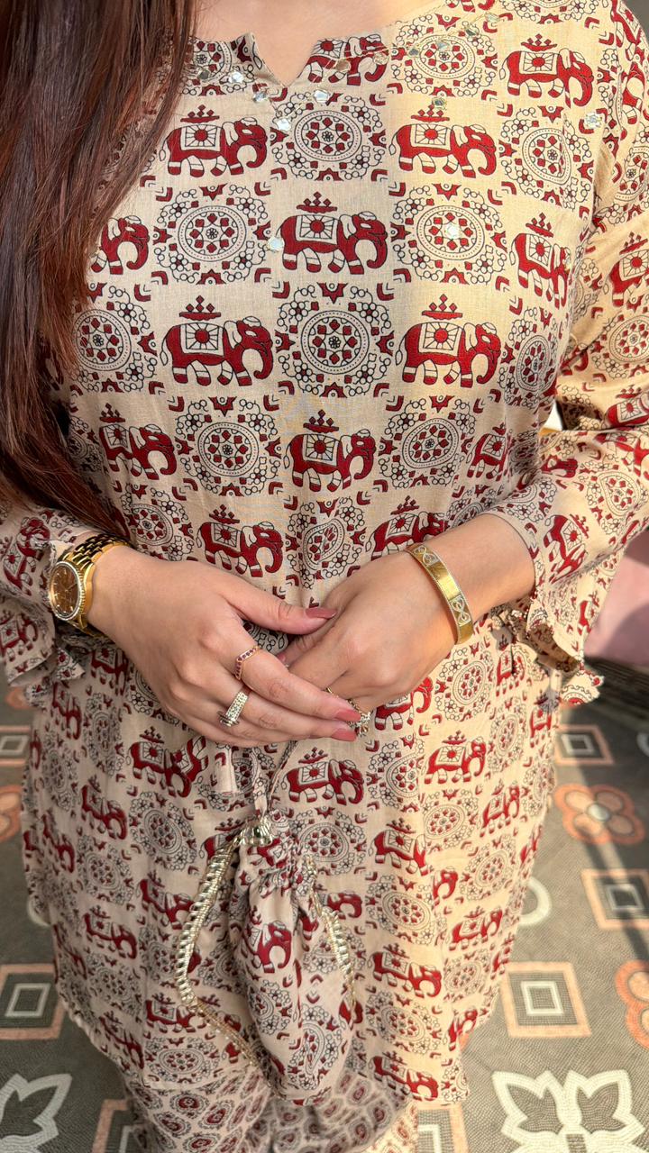 Beige elephant print cotton co-ord suit.