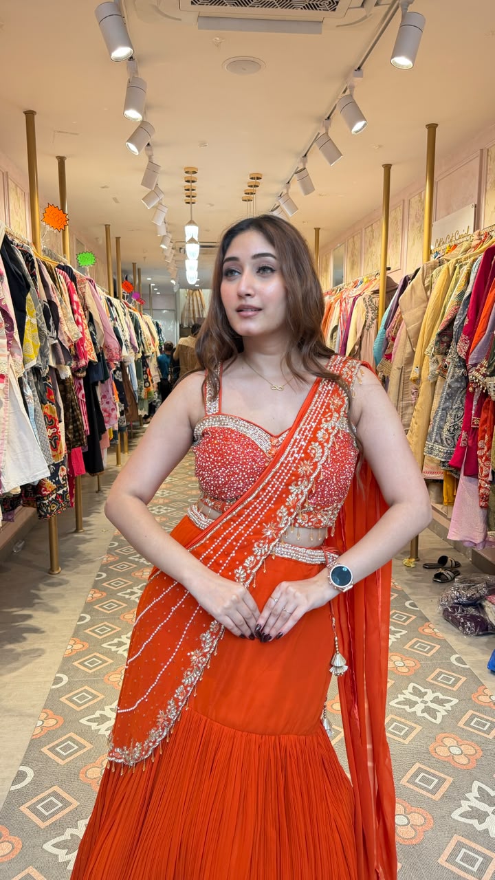 Vibrant royal orange statement saree