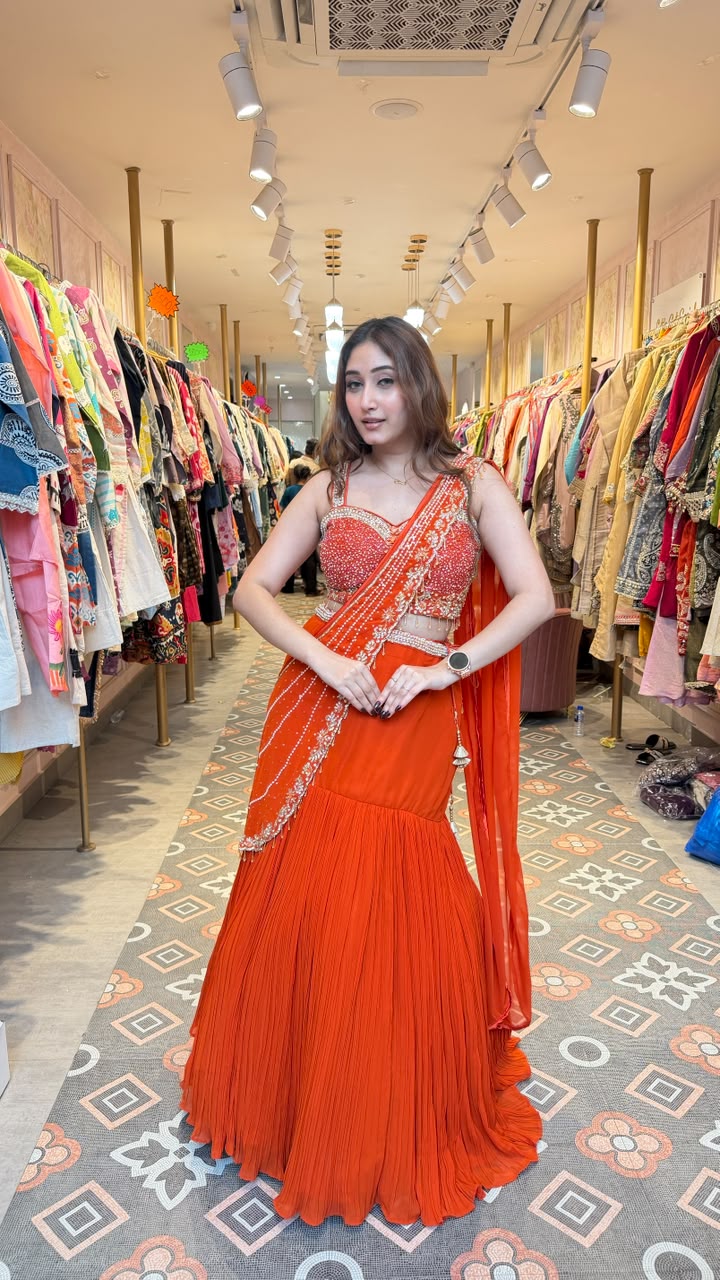 Vibrant royal orange statement saree