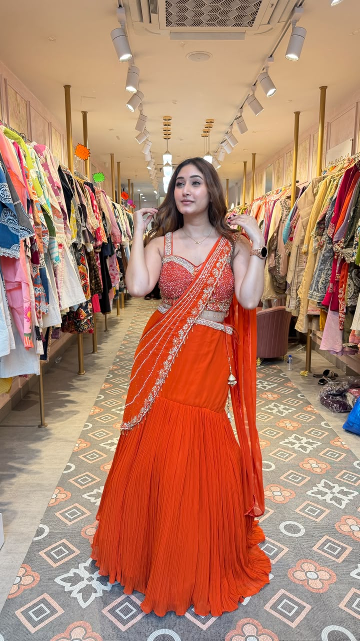 Vibrant royal orange statement saree