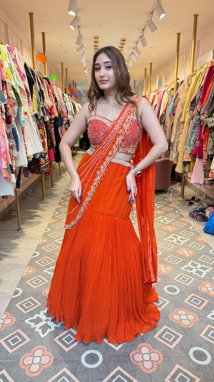 Vibrant royal orange statement saree