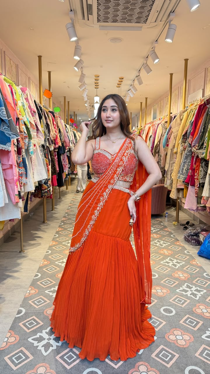 Vibrant royal orange statement saree