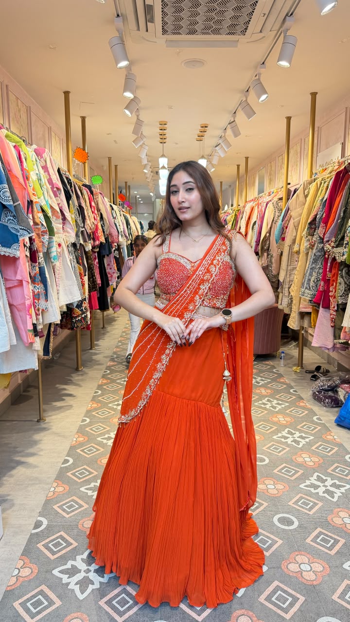 Vibrant royal orange statement saree