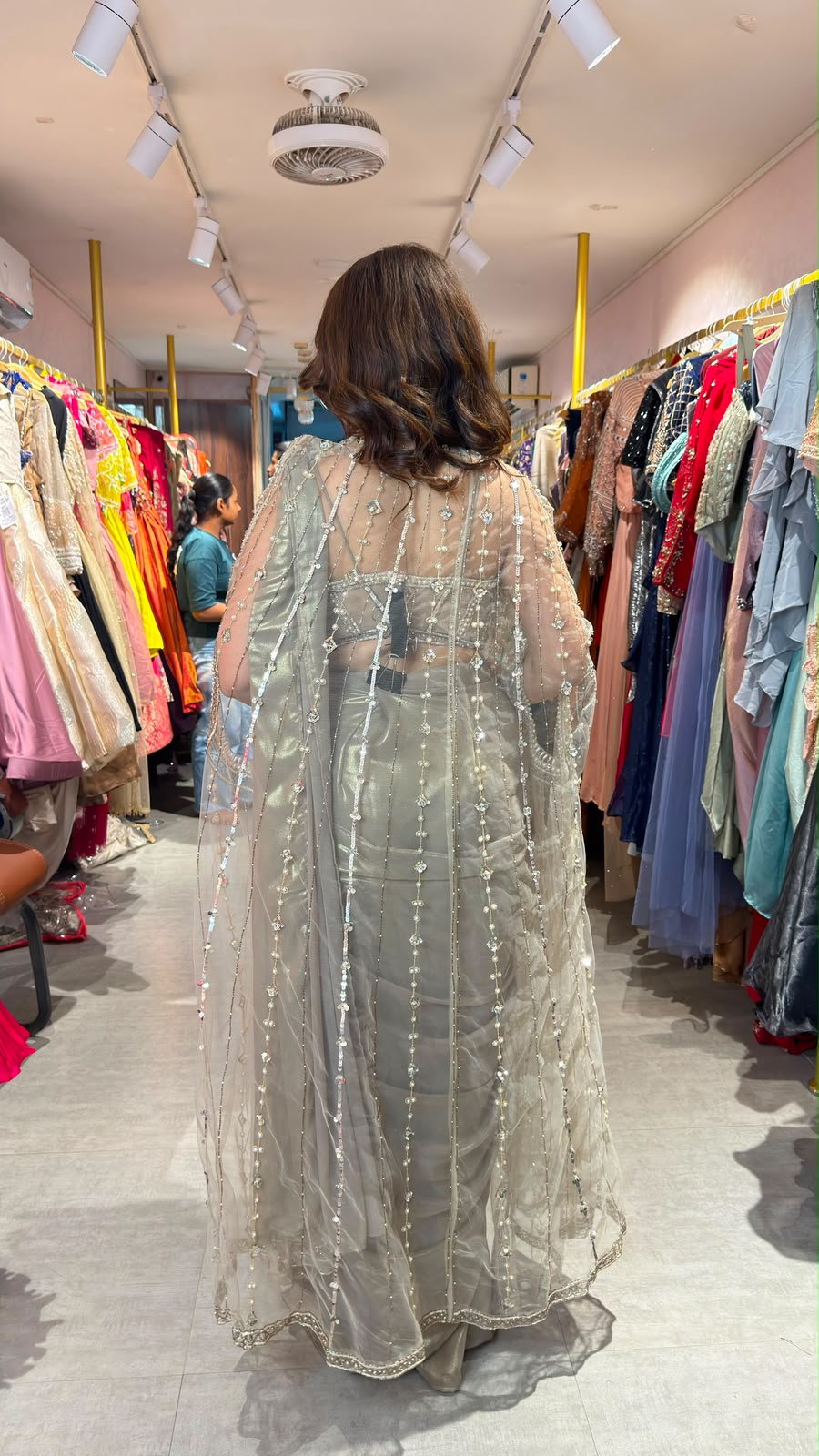 Designer Metallic Drape Saree with Embellished Corset Blouse & Beaded Cape