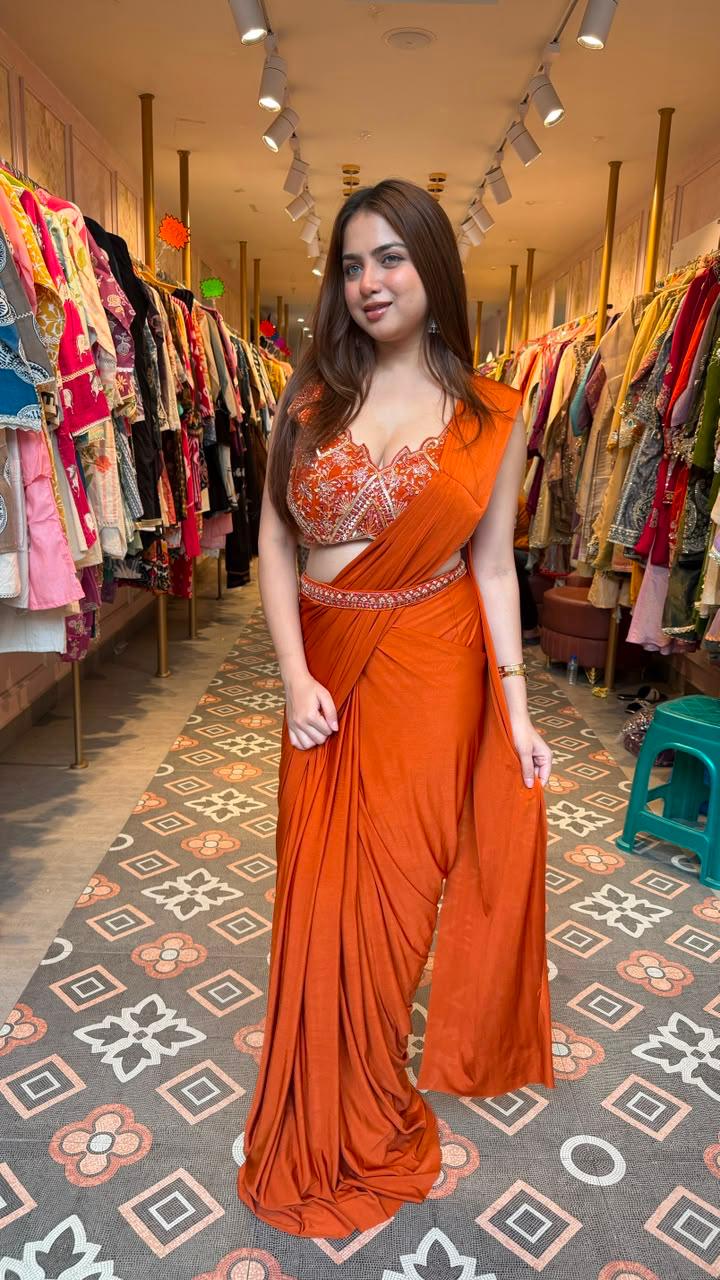 Vibrant royal orange statement saree
