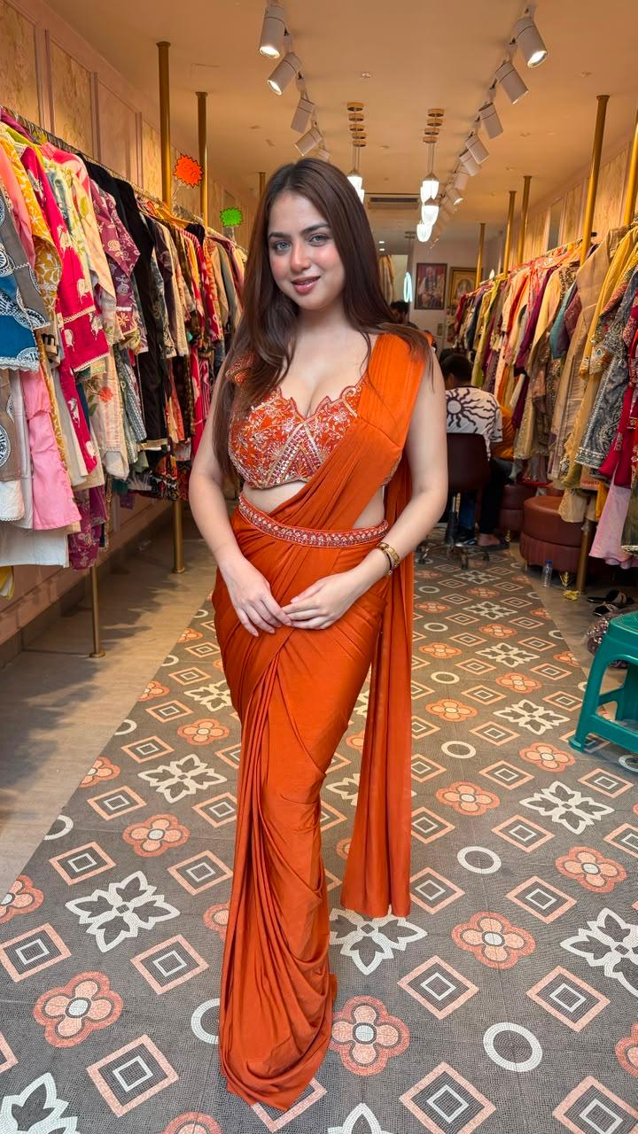 Vibrant royal orange statement saree