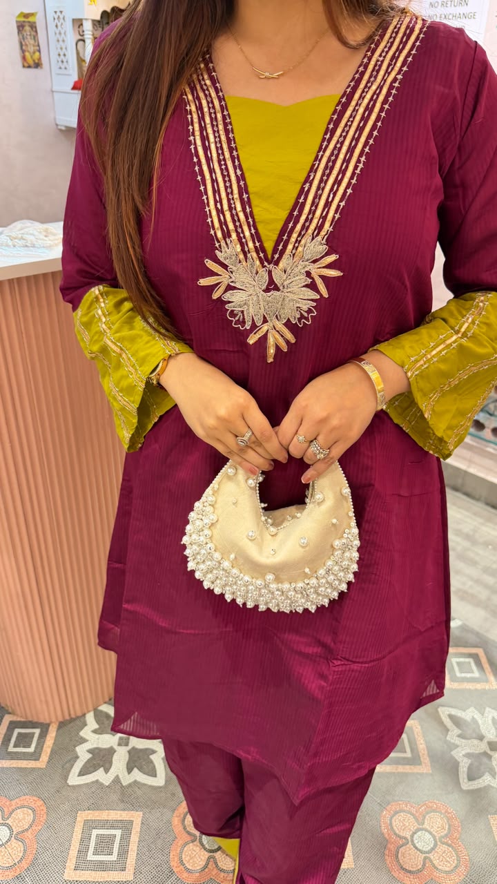 Magenta Embroidered Kurta Set with Contrast Accents