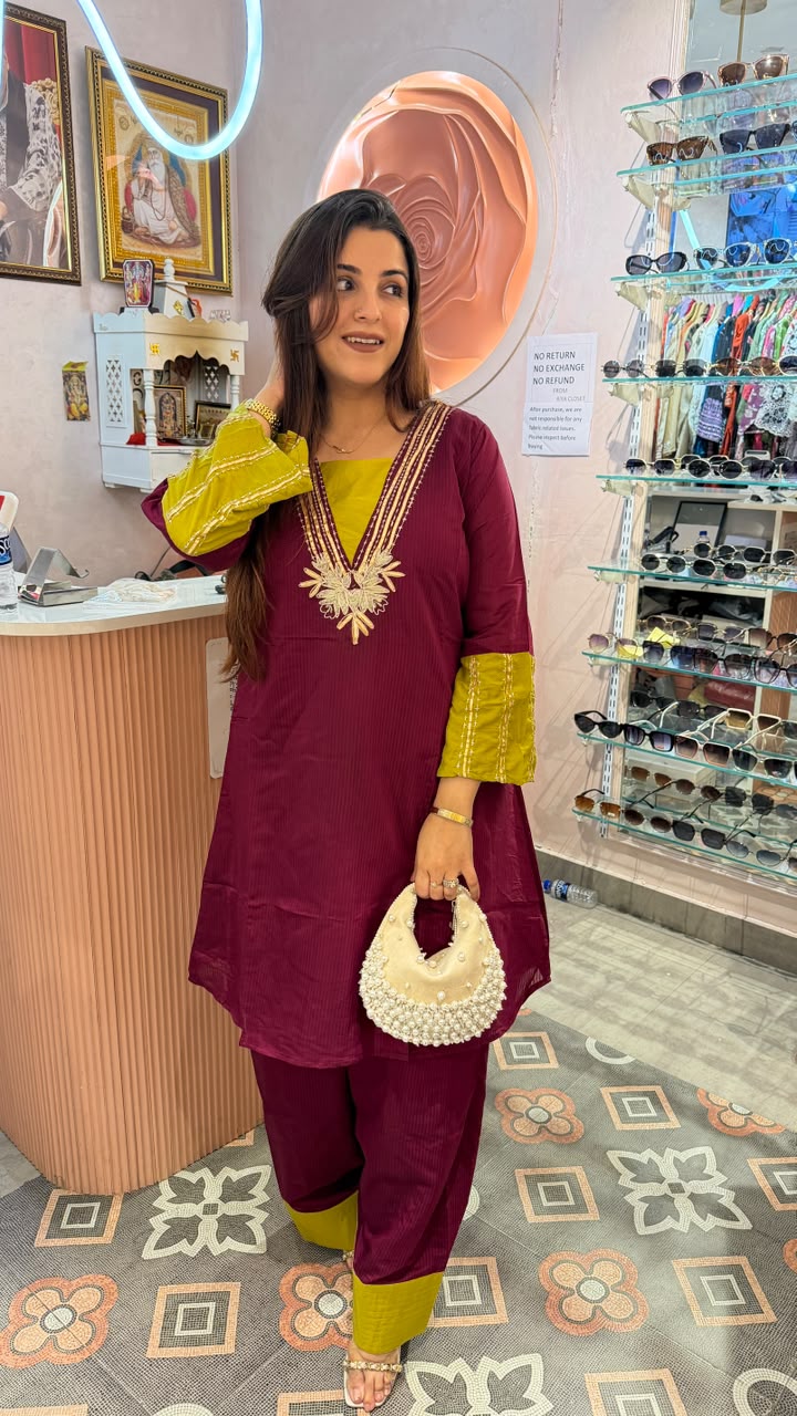 Magenta Embroidered Kurta Set with Contrast Accents