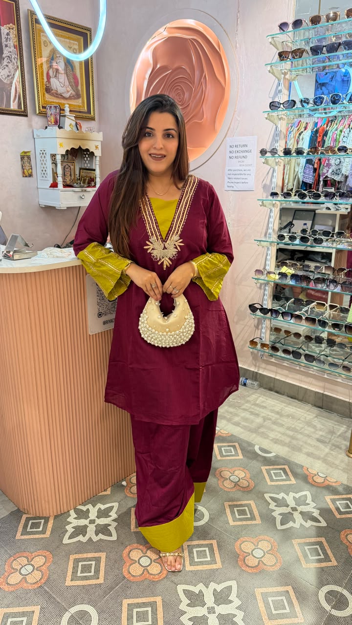 Magenta Embroidered Kurta Set with Contrast Accents