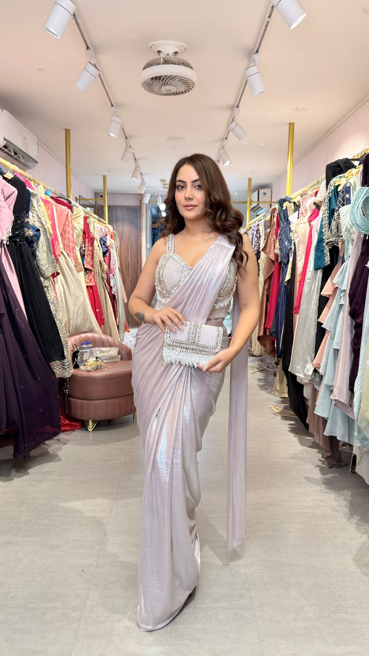 Pearl Draped Shimmer Saree comes with clutch