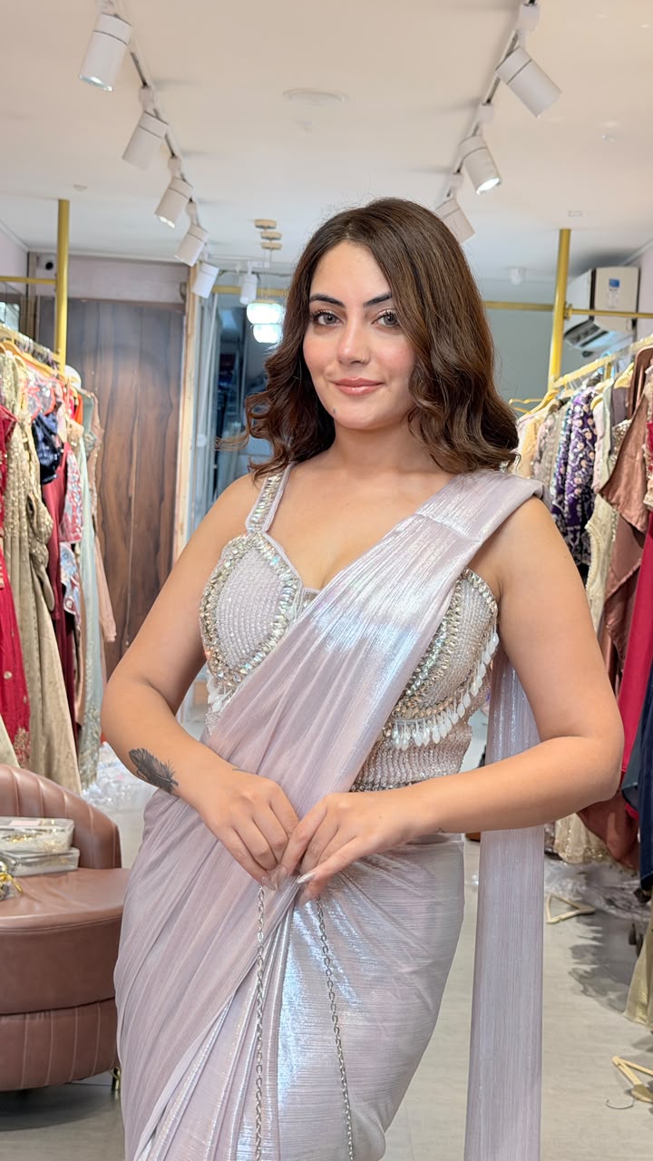 Pearl Draped Shimmer Saree comes with clutch